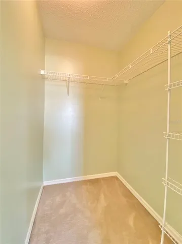 a view of a room with an empty space