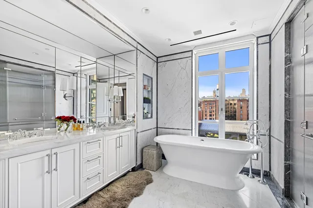 a view of a livingroom with furniture and a workspace