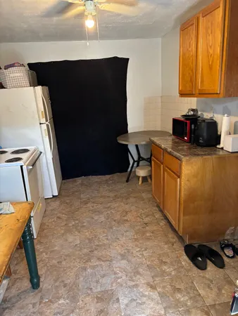 a workspace with furniture and window