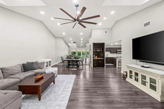 a bedroom with a bed and a couch