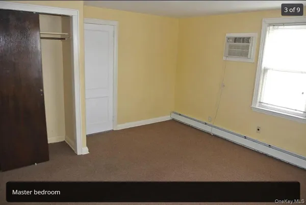 a view of a room that has a window in it