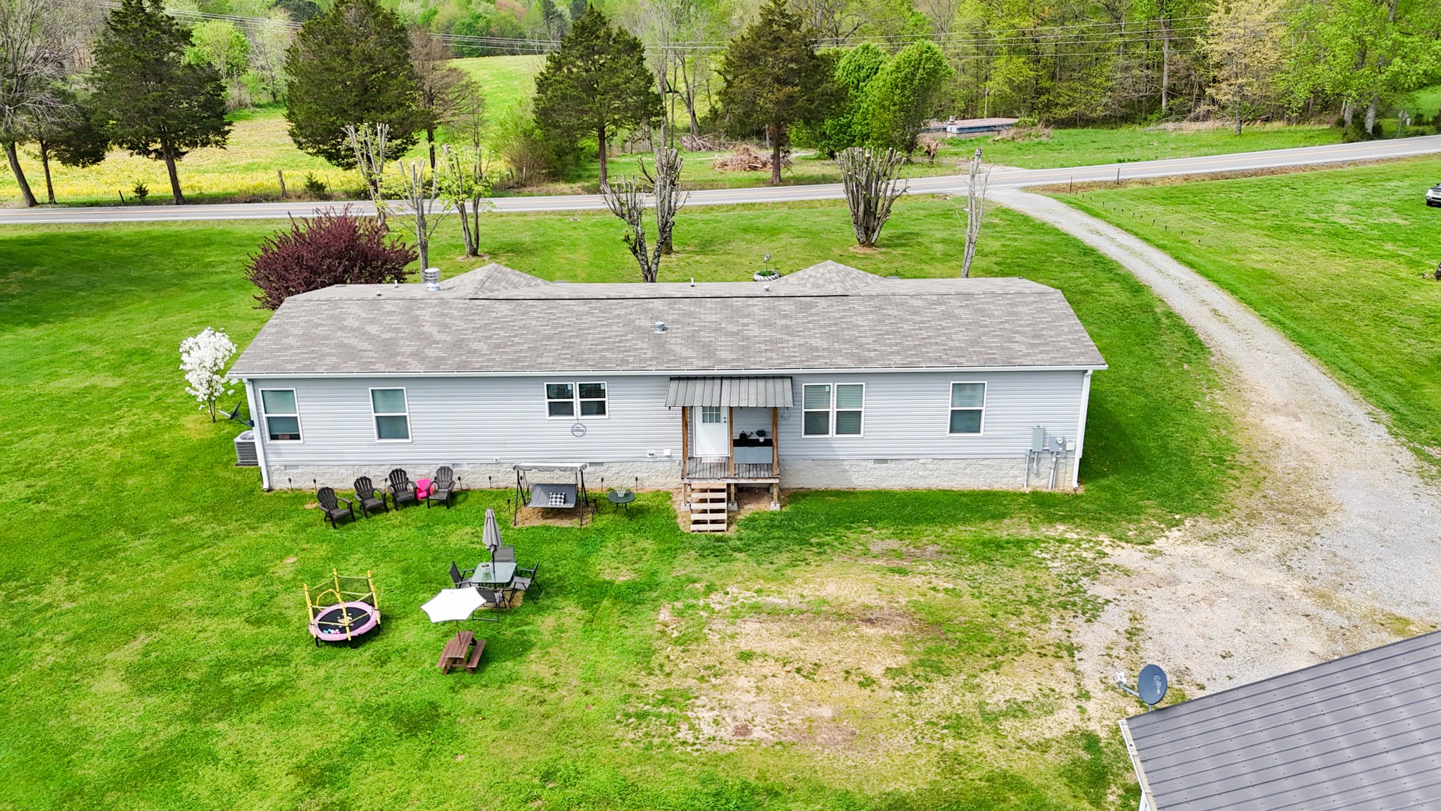 396 Gamaliel Road Red Boiling Springs, TN 37150 - Photo 3 of 45 a aerial view of a house with yard and green space