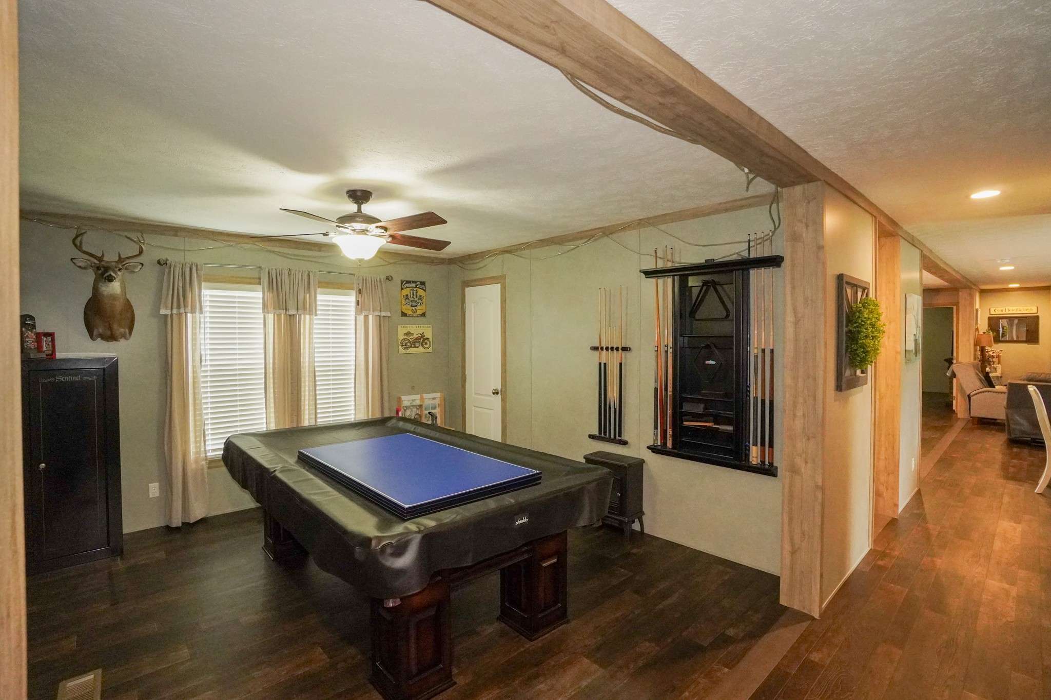 396 Gamaliel Road Red Boiling Springs, TN 37150 - Photo 32 of 45 a living room with pool table and a chandelier
