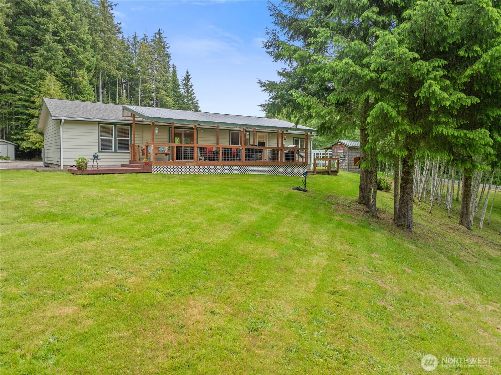 132 River Park Road Forks, WA 98331 - Photo 2 of 40 a view of a house with a backyard