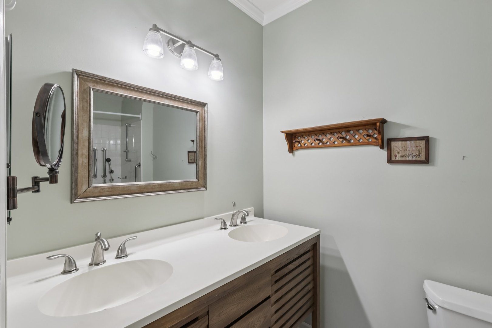 1262 Rhodes Lane Naperville, IL 60540 - Photo 19 of 23 a bathroom with a sink and a mirror