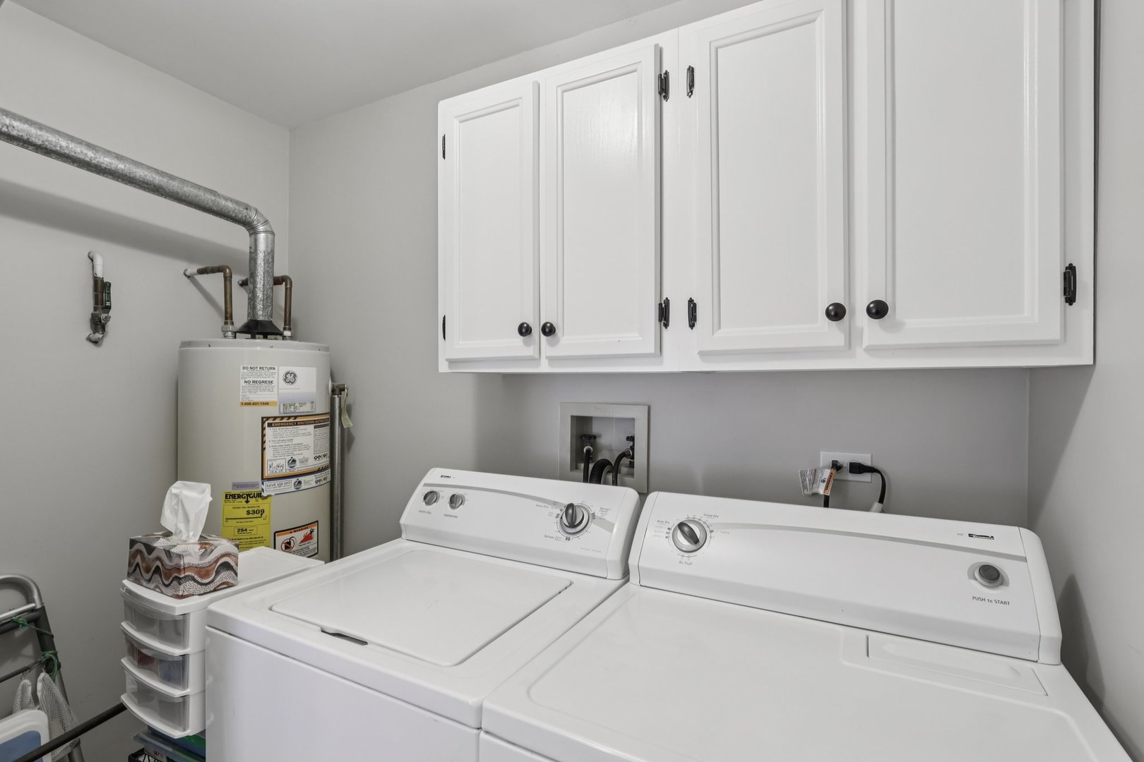 1262 Rhodes Lane Naperville, IL 60540 - Photo 20 of 23 a utility room with dryer and washer