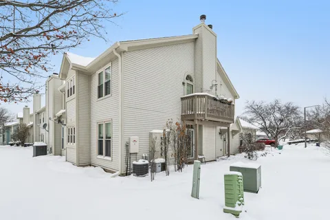 a view of a house with a street