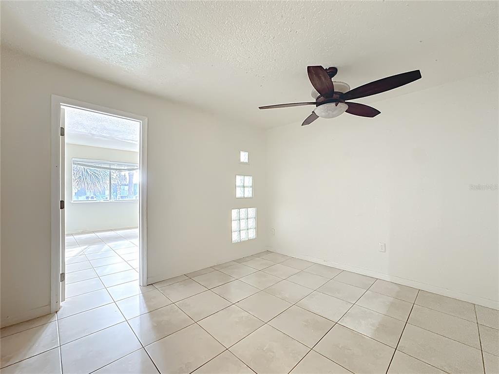 1928 South Conway Road, Unit 33 Orlando, FL 32812 - Photo 15 of 34 a view of an empty room and window