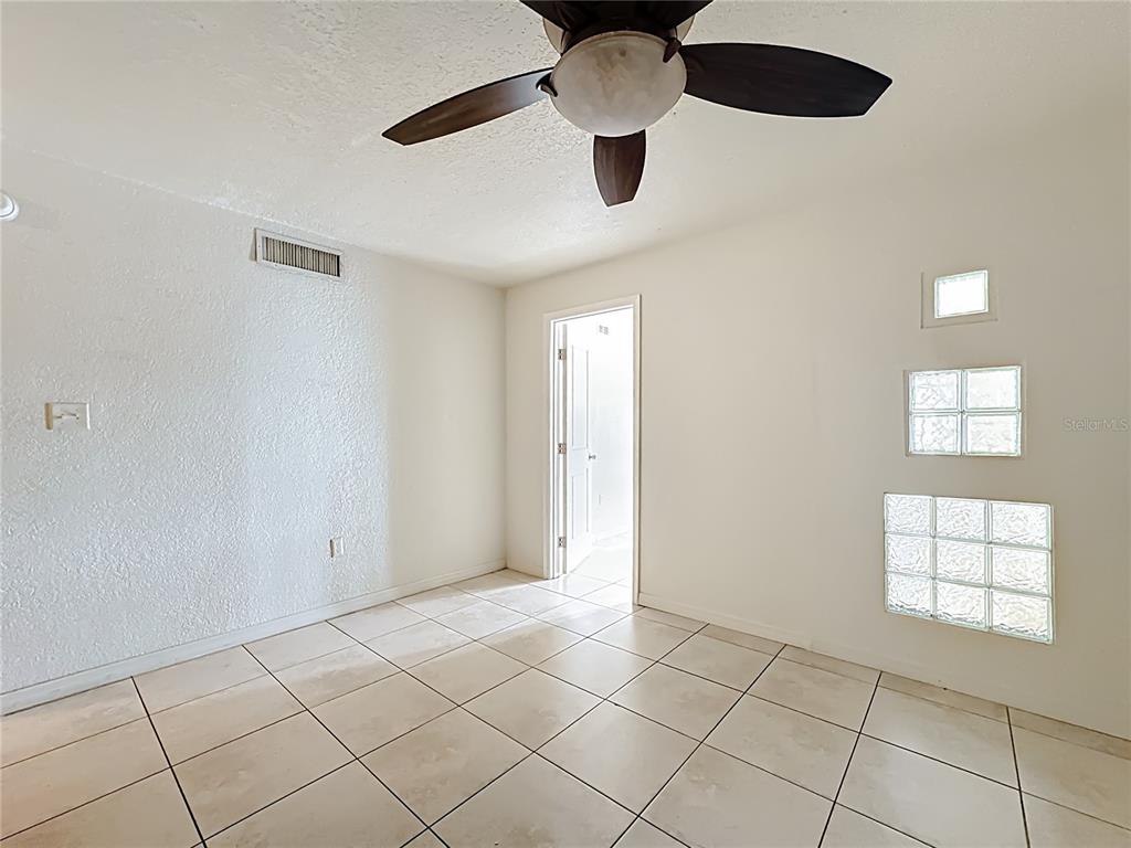 1928 South Conway Road, Unit 33 Orlando, FL 32812 - Photo 18 of 34 a view of an empty room and window