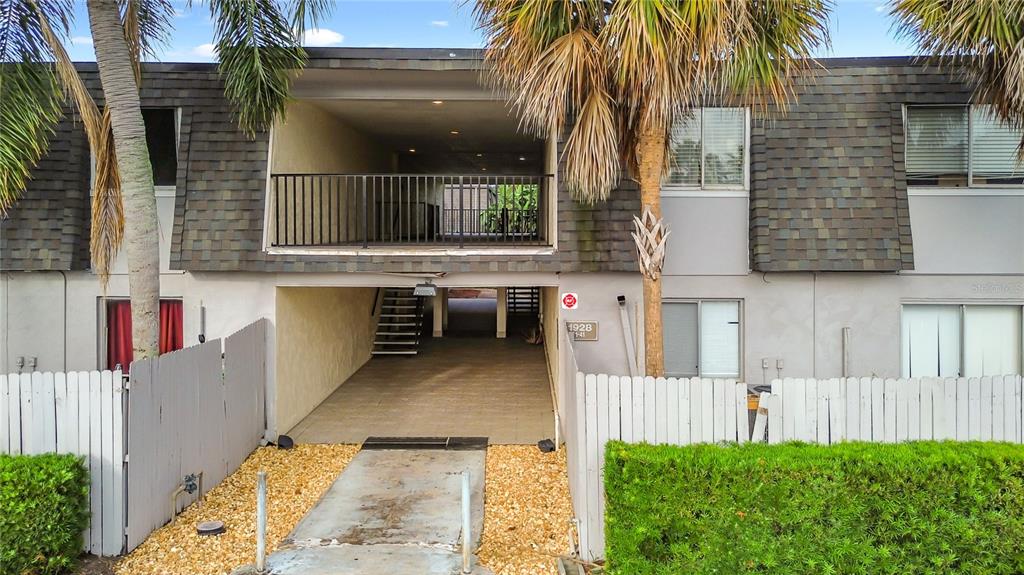 1928 South Conway Road, Unit 33 Orlando, FL 32812 - Photo 2 of 34 a view of backyard with barbeque oven and outdoor seating