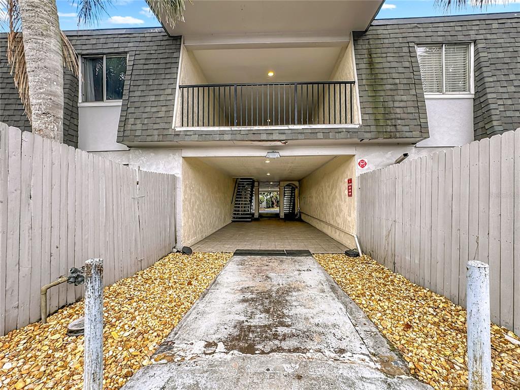 1928 South Conway Road, Unit 33 Orlando, FL 32812 - Photo 6 of 34 a view of a pathway with a house