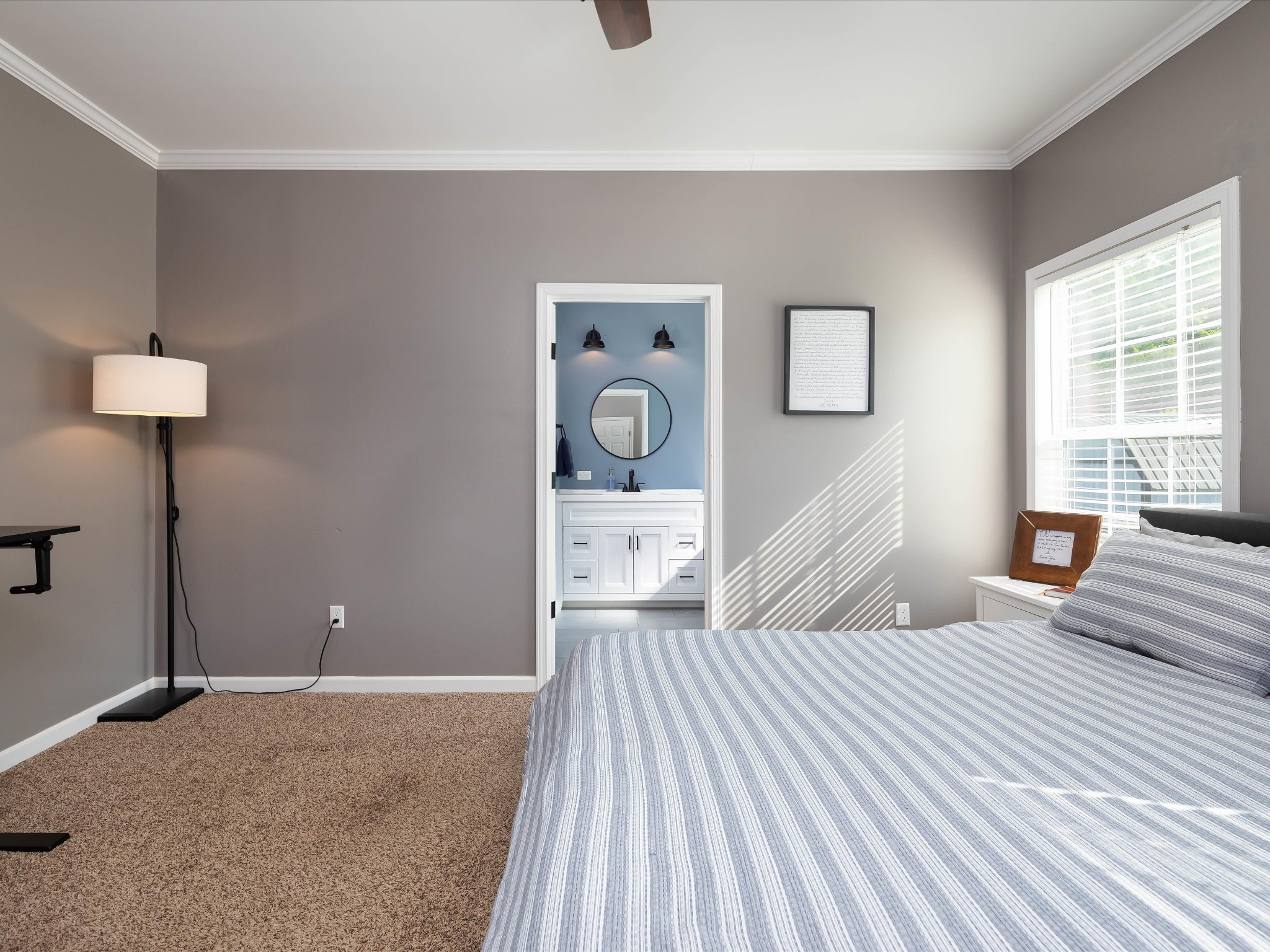 1150 Wrights Mill Road Spring Hill, TN 37174 - Photo 17 of 34 a bedroom with a bed and a lamp on table