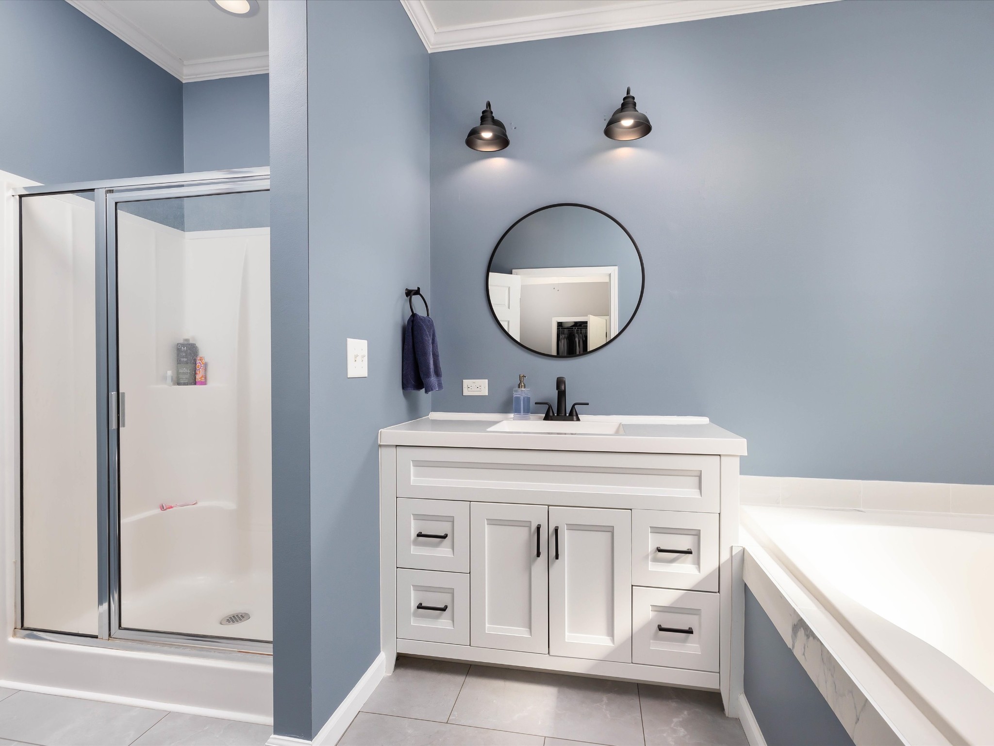 1150 Wrights Mill Road Spring Hill, TN 37174 - Photo 19 of 34 a en suite bathroom with a sink and a mirror