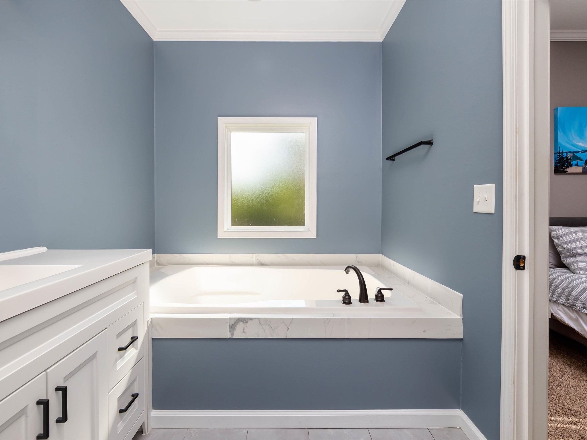 1150 Wrights Mill Road Spring Hill, TN 37174 - Photo 20 of 34 a bathroom with a bathtub and a sink