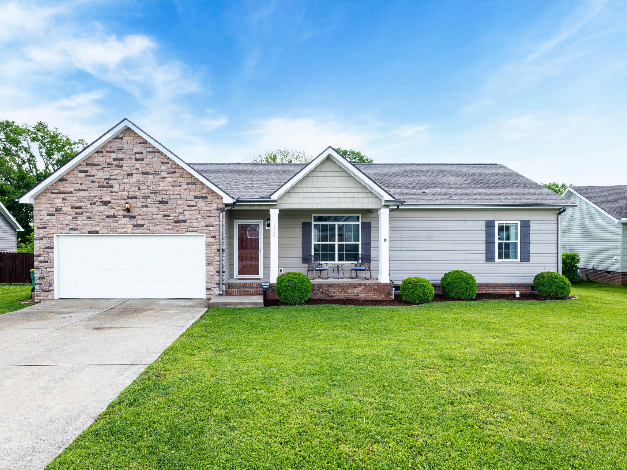 1150 Wrights Mill Road Spring Hill, TN 37174 - Photo 28 of 34 a front view of a house with a garden