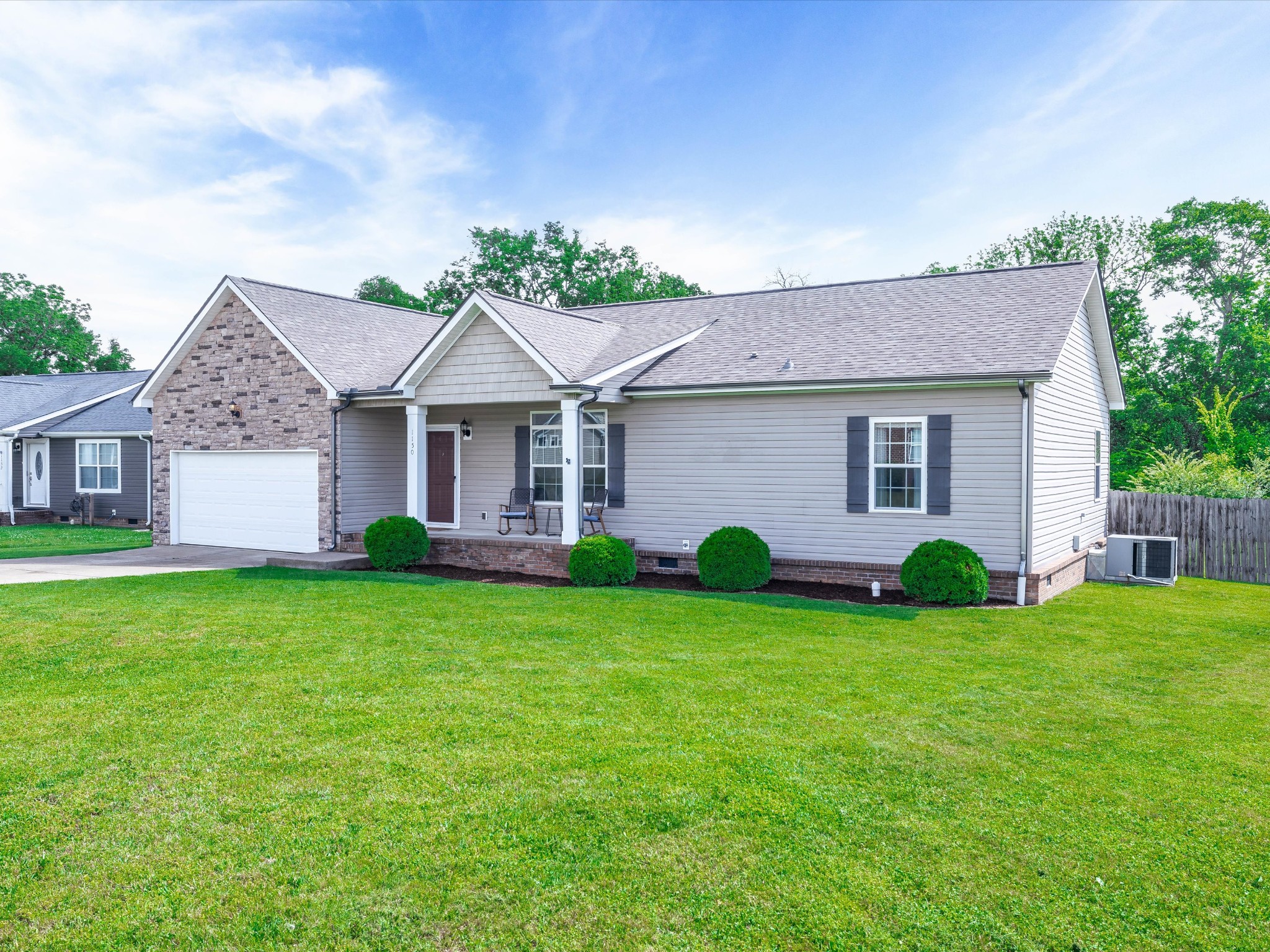 1150 Wrights Mill Road Spring Hill, TN 37174 - Photo 29 of 34 a view of a house with a yard and potted plants