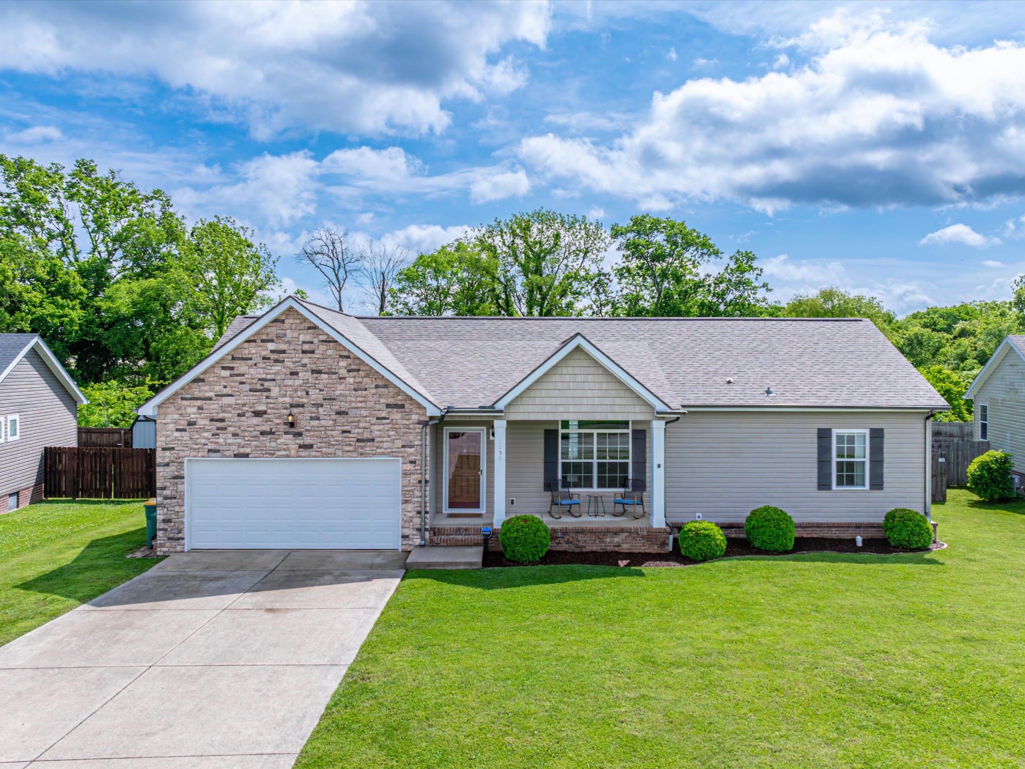 1150 Wrights Mill Road Spring Hill, TN 37174 - Photo 3 of 34 a front view of a house with a yard