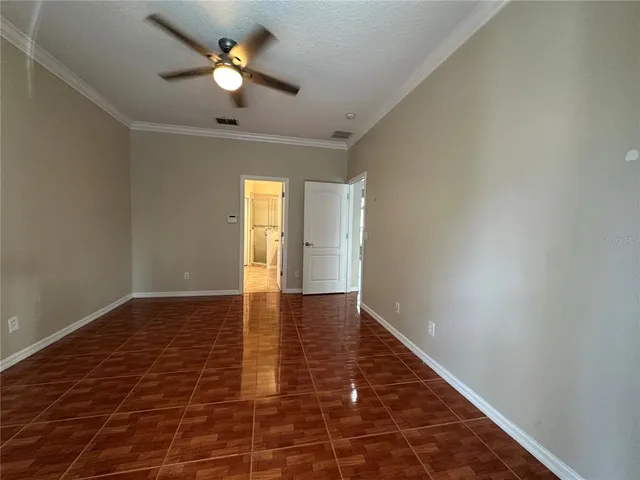 a bathroom with a granite countertop sink a bathtub and a shower