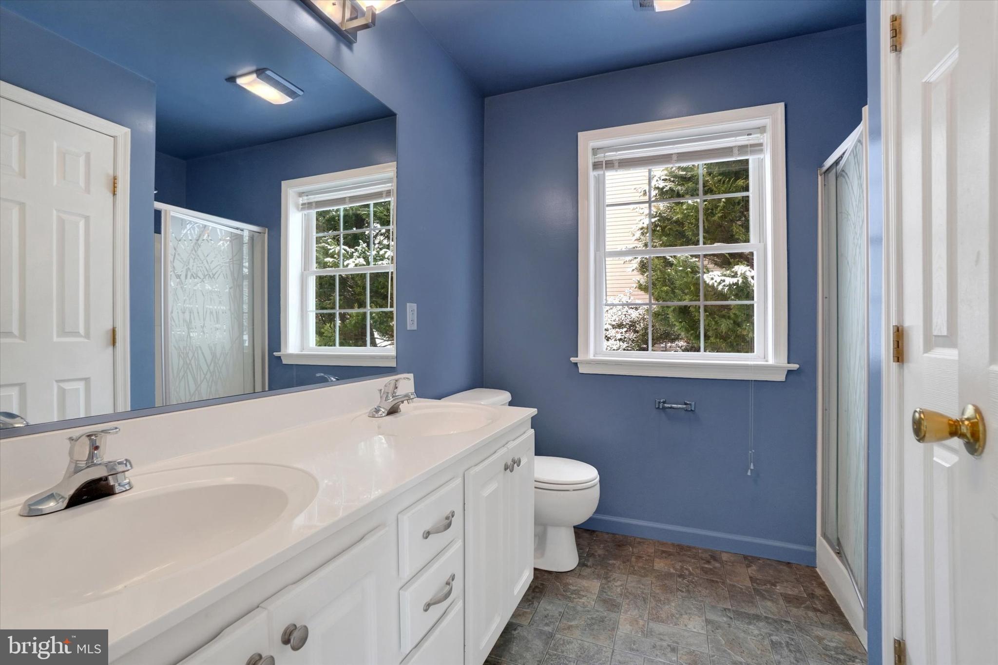 595 Apple Tree Lane Mount Wolf, PA 17347 - Photo 14 of 27 a bathroom with a sink and a mirror