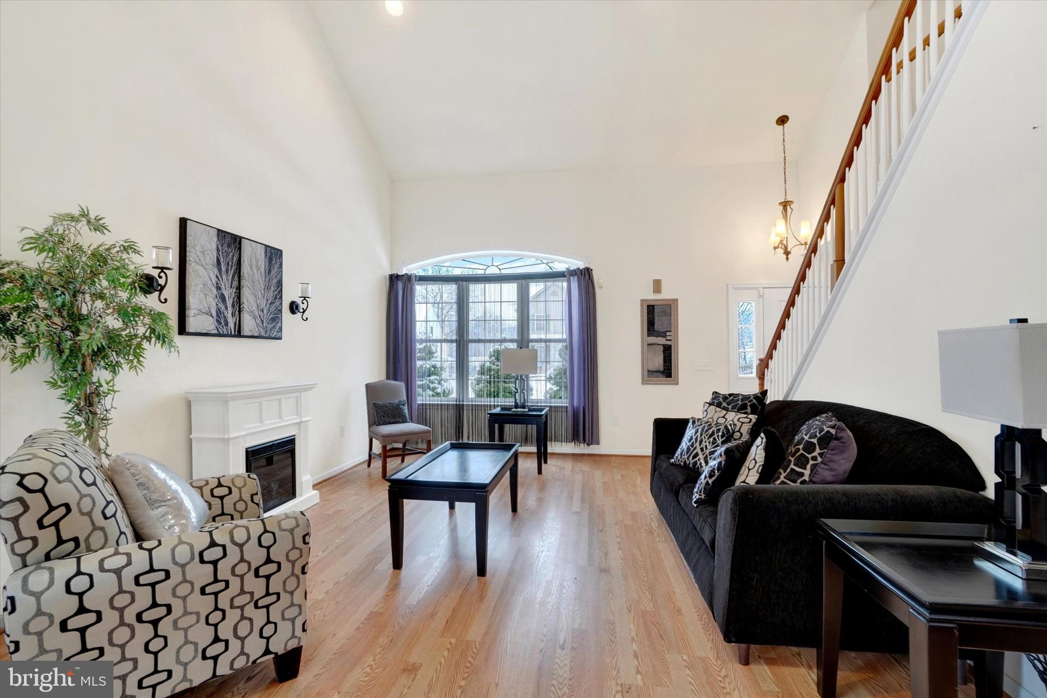 595 Apple Tree Lane Mount Wolf, PA 17347 - Photo 2 of 27 a living room with furniture and a fireplace