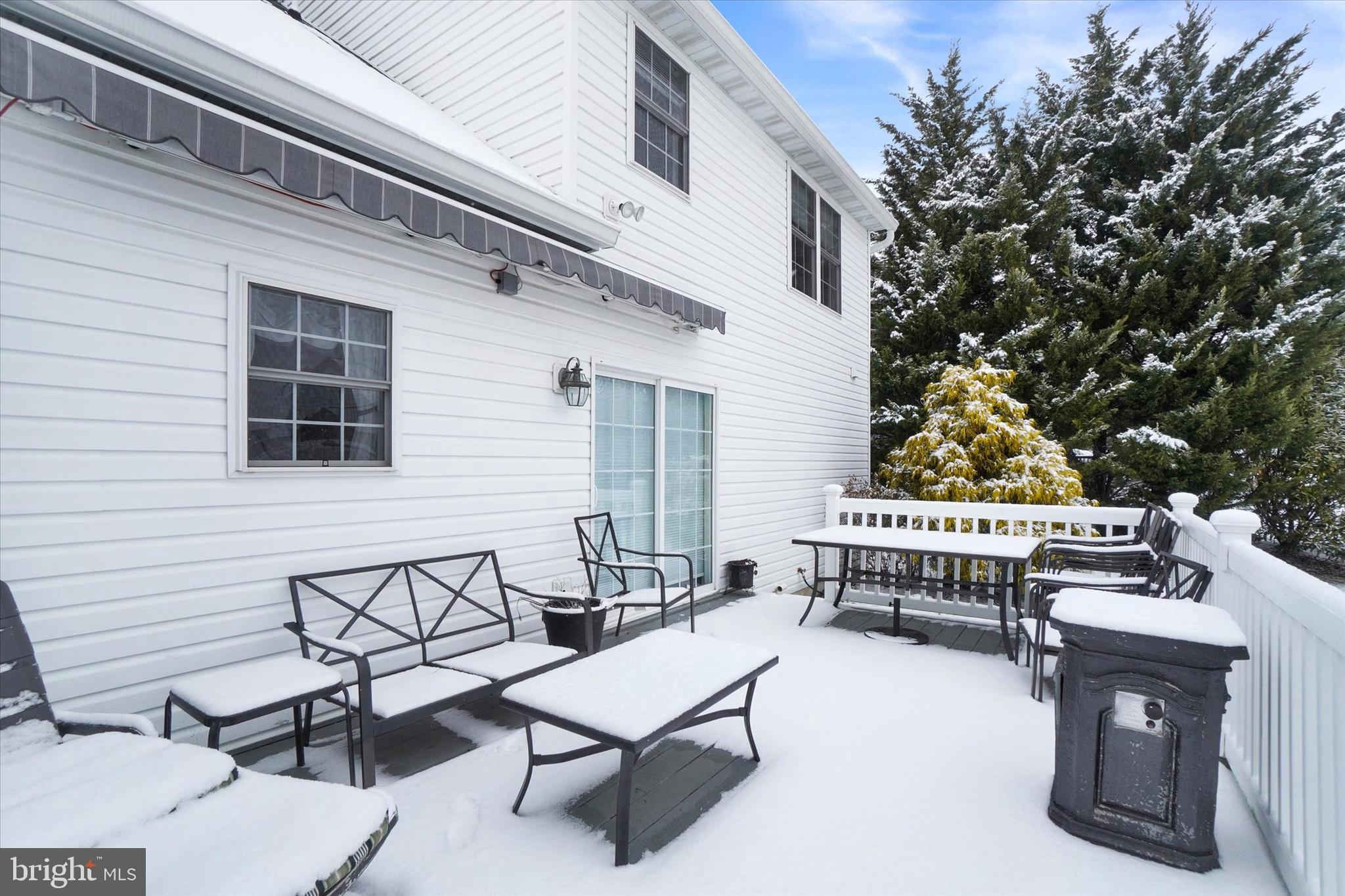 595 Apple Tree Lane Mount Wolf, PA 17347 - Photo 23 of 27 a roof deck with a bench and chairs