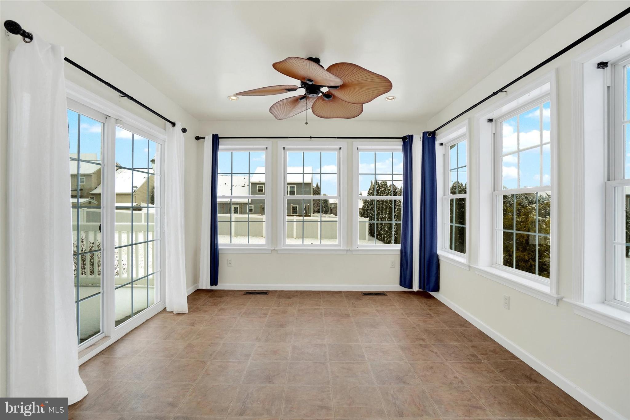 595 Apple Tree Lane Mount Wolf, PA 17347 - Photo 8 of 27 a view of an empty room with a large window