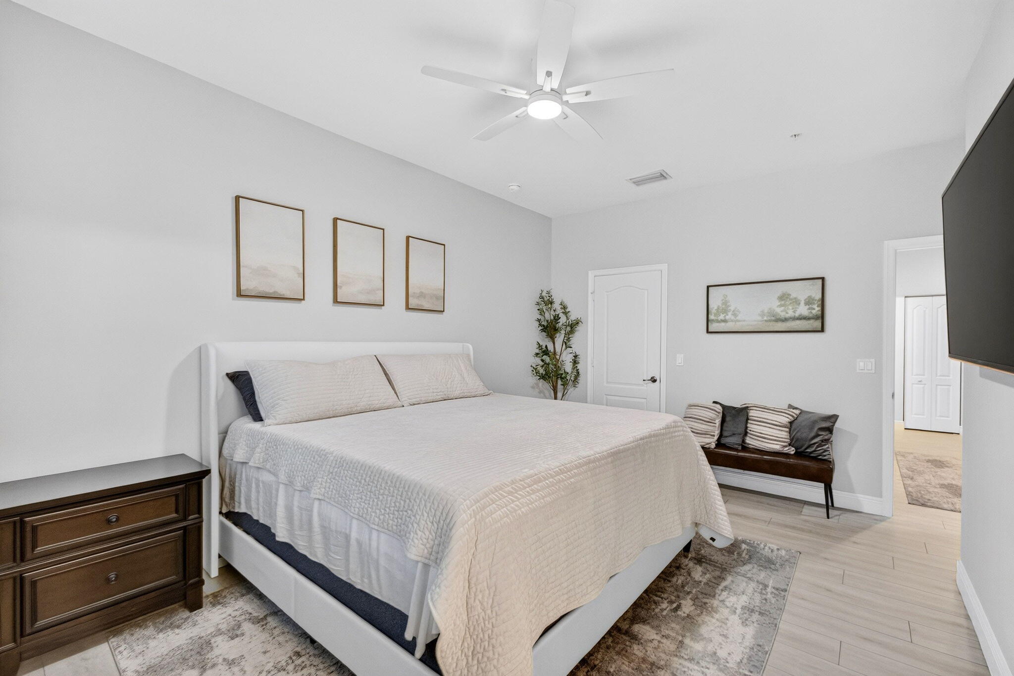 9523 Southwest Merlin Court Stuart, FL 34997 - Photo 22 of 43 PRIMARY BEDROOM