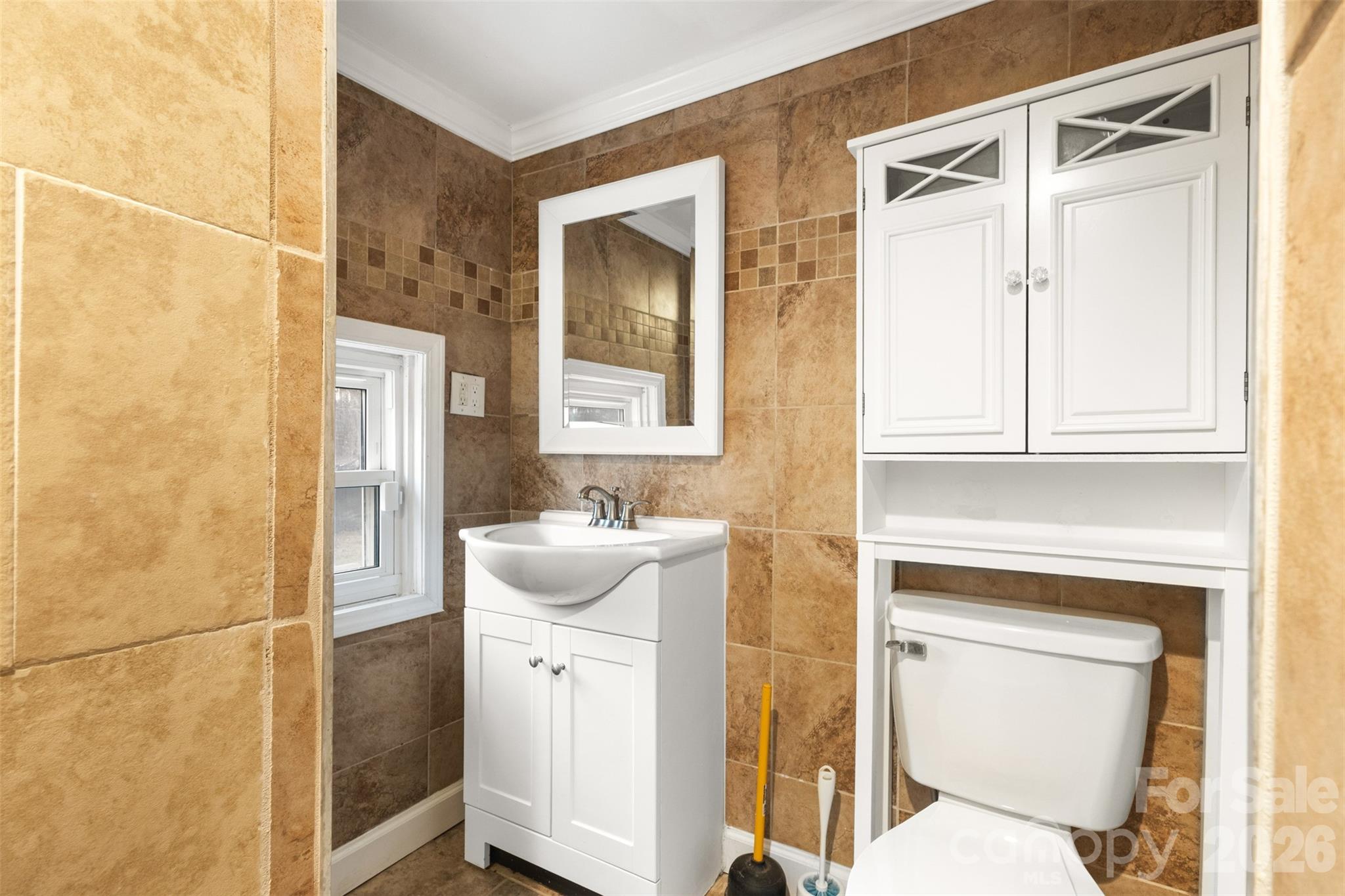 1751 Robert Martin Road Catawba, NC 28609 - Photo 16 of 29 a bathroom with a toilet sink and mirror