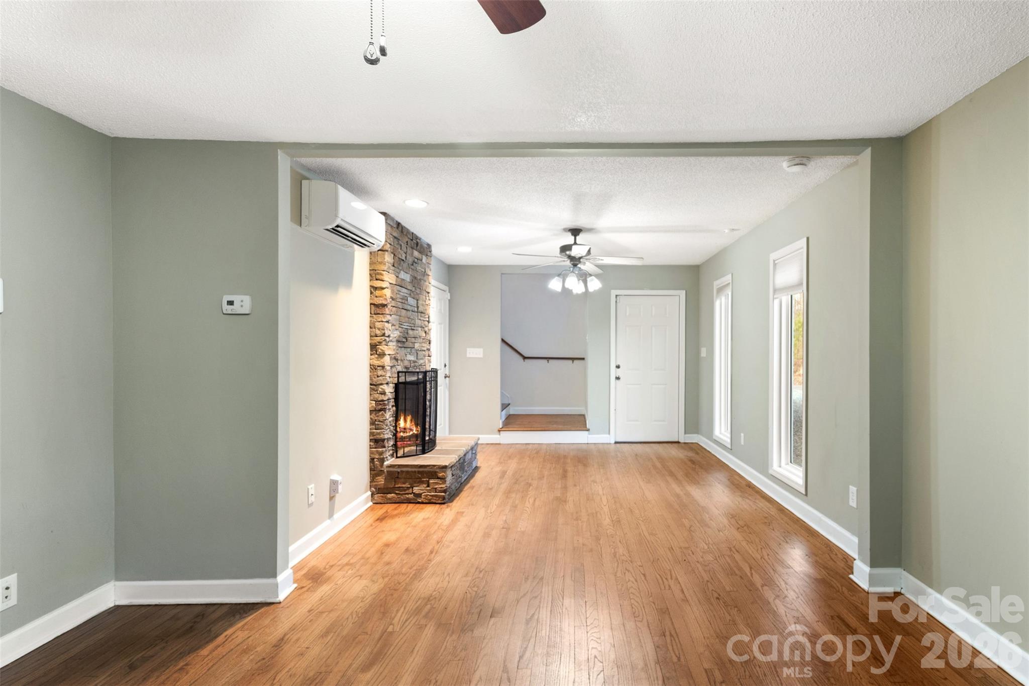 1751 Robert Martin Road Catawba, NC 28609 - Photo 25 of 29 wooden floor in an empty room with a window