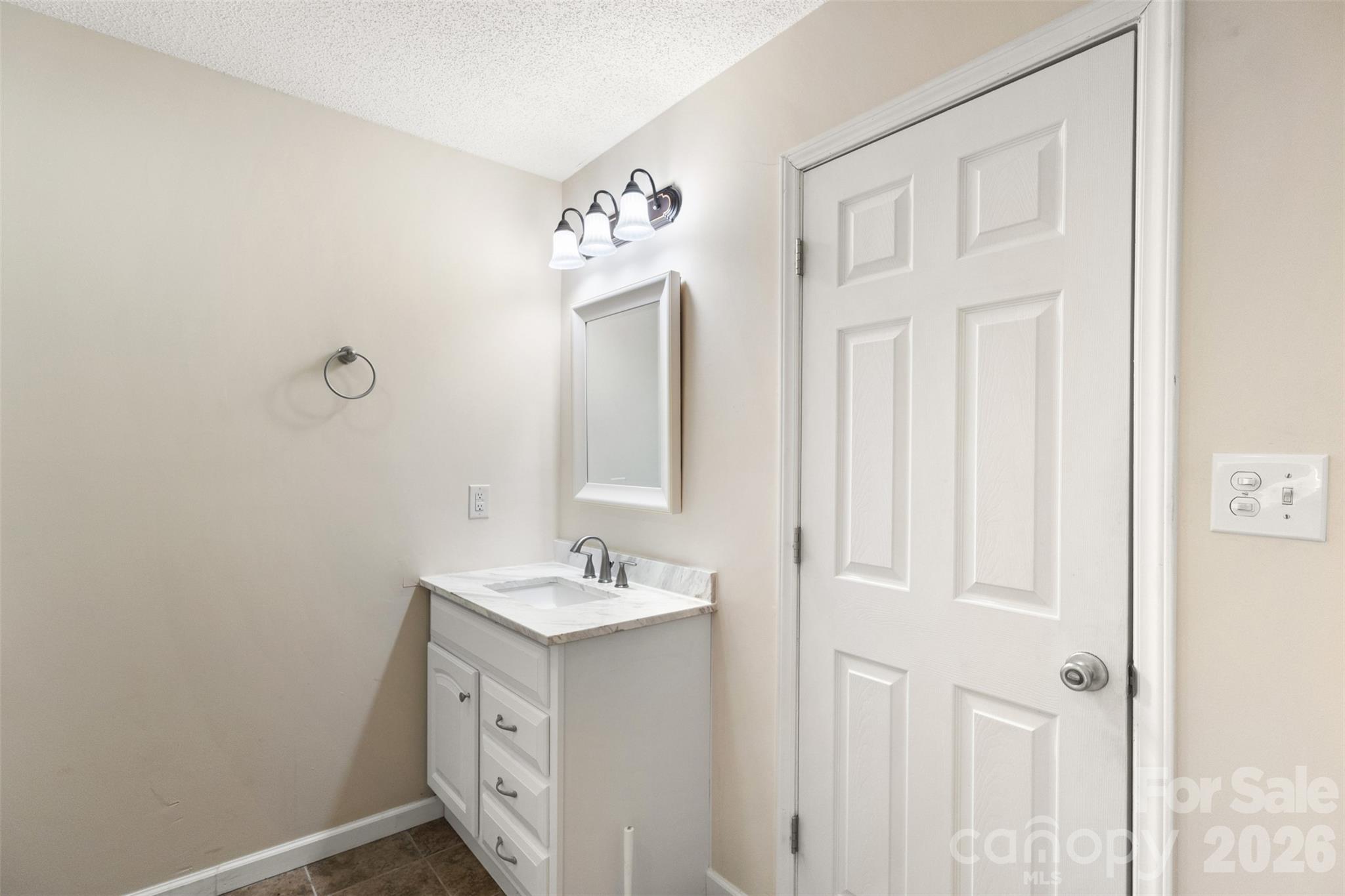 1751 Robert Martin Road Catawba, NC 28609 - Photo 6 of 29 a bathroom with a sink and a mirror