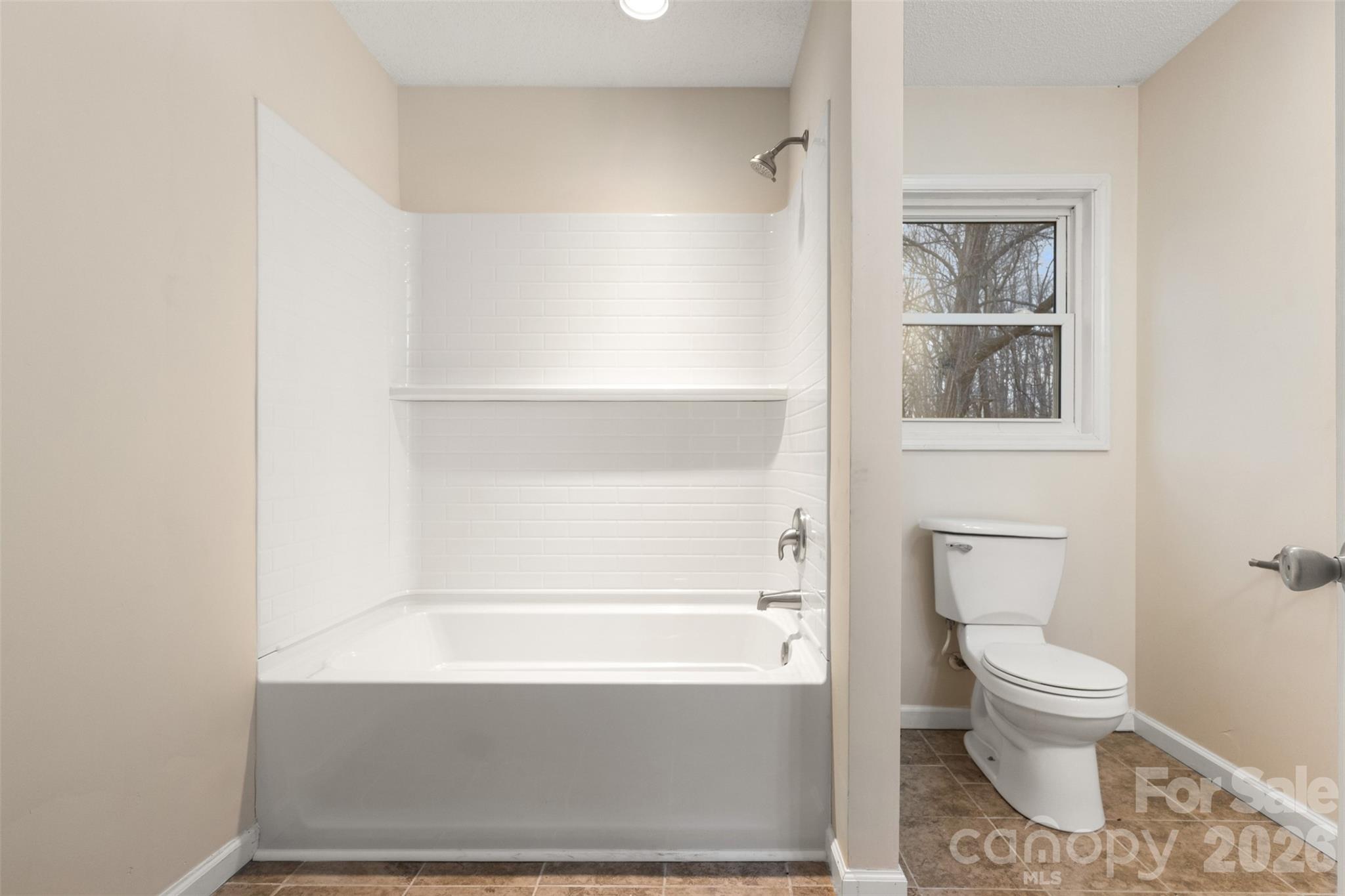 1751 Robert Martin Road Catawba, NC 28609 - Photo 10 of 29 a bathroom with a toilet and a shower