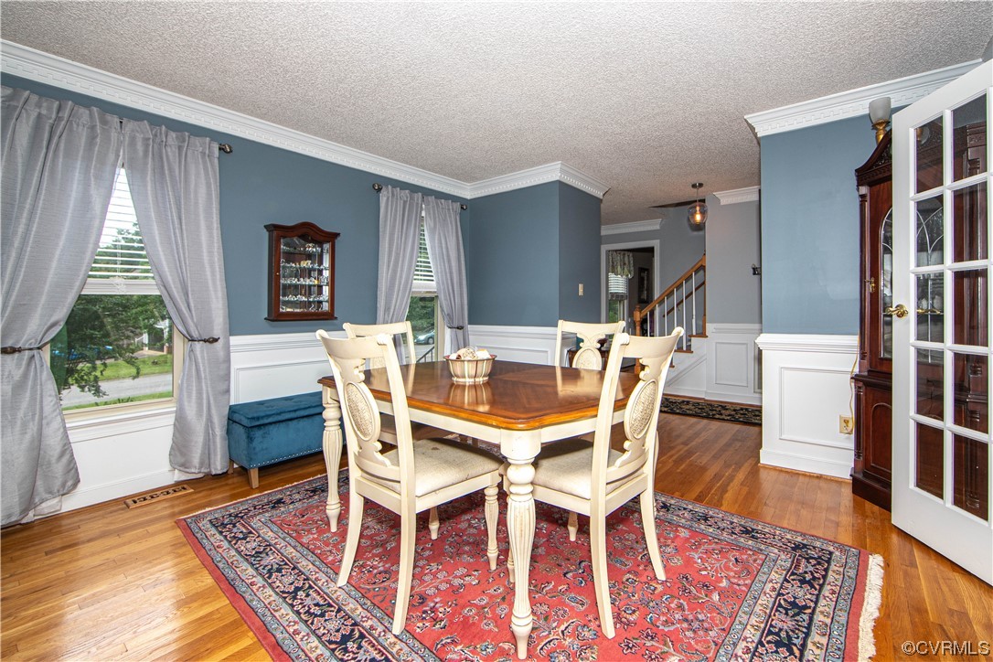 14908 Walnut Bend Road Midlothian, VA 23112 - Photo 13 of 43 a dining room with furniture window wooden floor