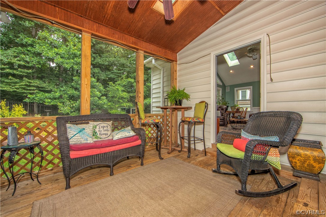 14908 Walnut Bend Road Midlothian, VA 23112 - Photo 14 of 43 a living room with furniture and floor to ceiling windows