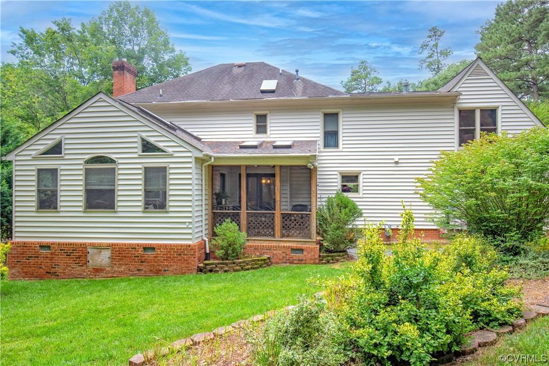 14908 Walnut Bend Road Midlothian, VA 23112 - Photo 2 of 43 a front view of a house with a garden