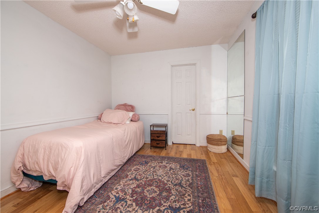 14908 Walnut Bend Road Midlothian, VA 23112 - Photo 24 of 43 a bedroom with a bed and a window