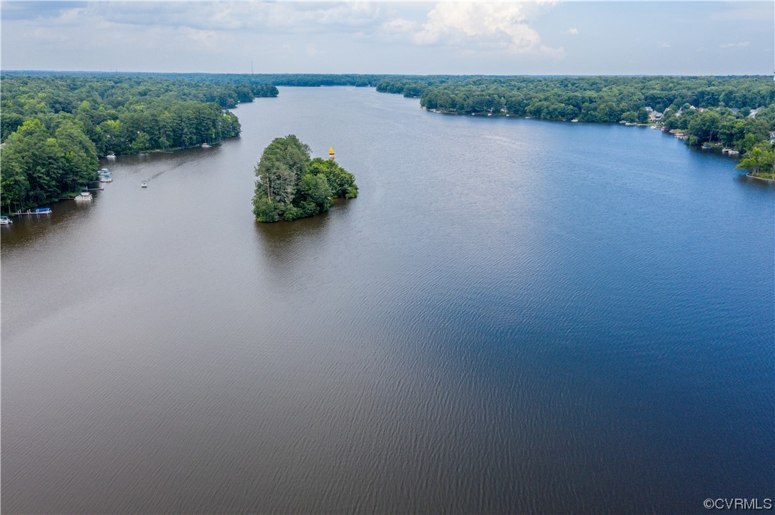 14908 Walnut Bend Road Midlothian, VA 23112 - Photo 35 of 43 a view of a lake with a house in background