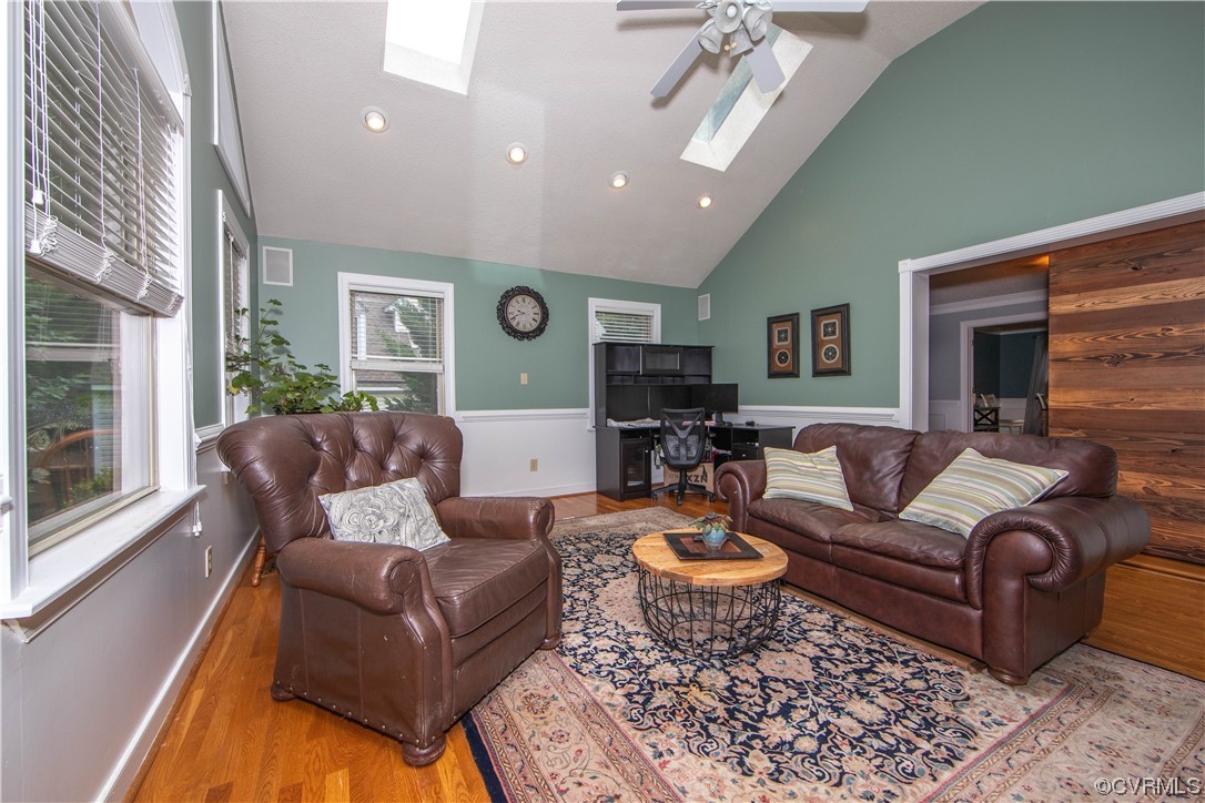 14908 Walnut Bend Road Midlothian, VA 23112 - Photo 6 of 43 a living room with furniture ceiling fan and a rug