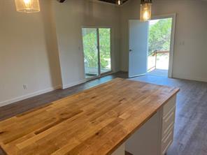15430 Stroup Circle, Unit 2 Austin, TX 78734 - Photo 6 of 10 a view of an empty room and window