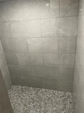 15430 Stroup Circle, Unit 2 Austin, TX 78734 - Photo 8 of 10 a bathroom with a shower