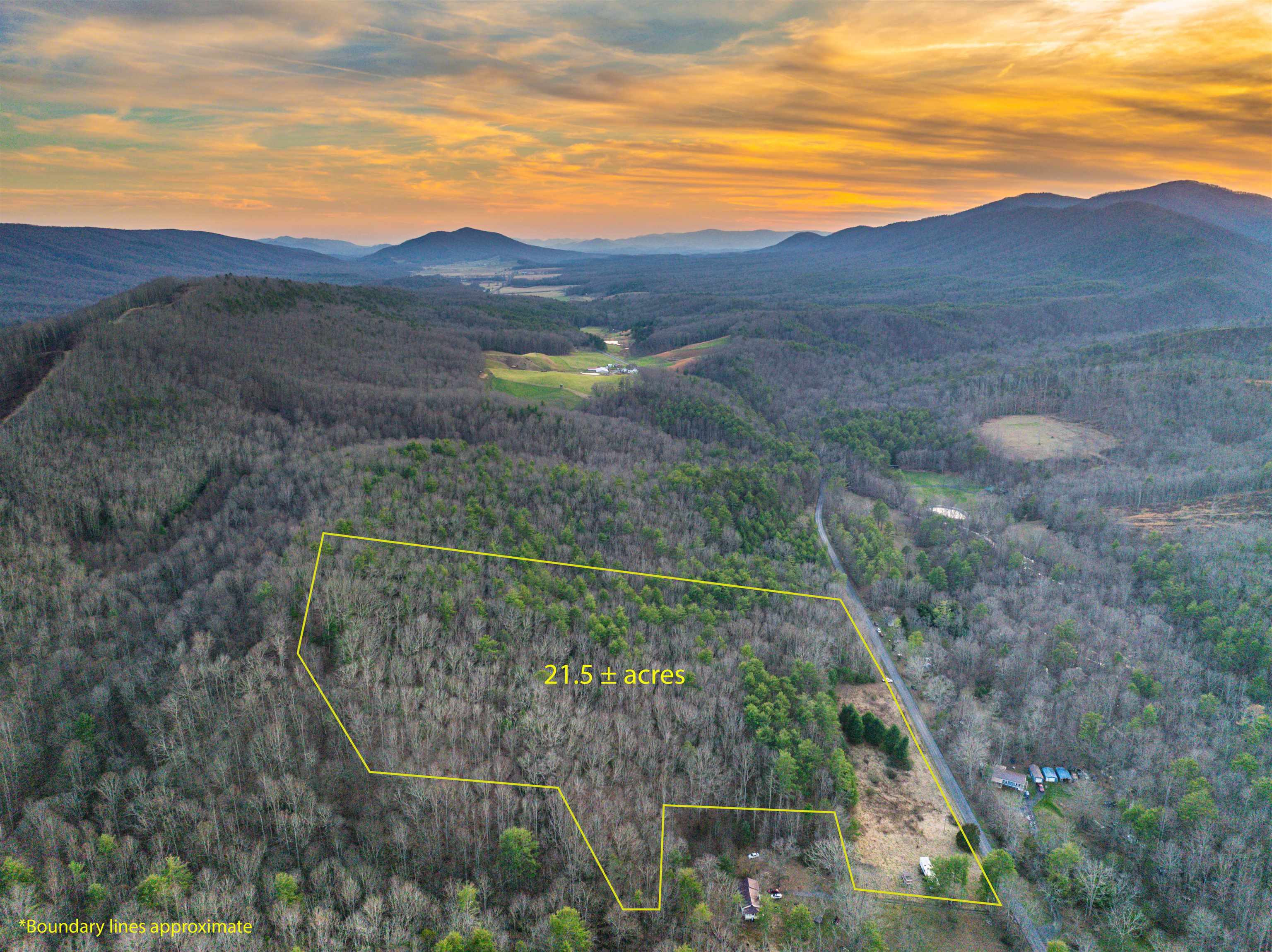 4358 Deerfield Valley Road Deerfield, VA 24432 - Photo 3 of 28 a view of a field with a mountain in the background