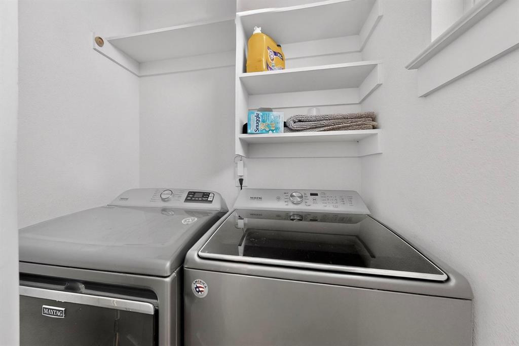 2015 Volga Avenue Dallas, TX 75216 - Photo 34 of 38 Laundry area with washer and clothes dryer