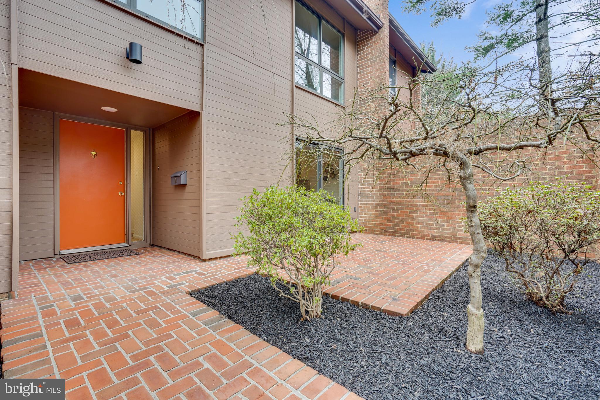 11797 Indian Ridge Road Reston, VA 20191 - Photo 1 of 33 a view of a backyard of the house