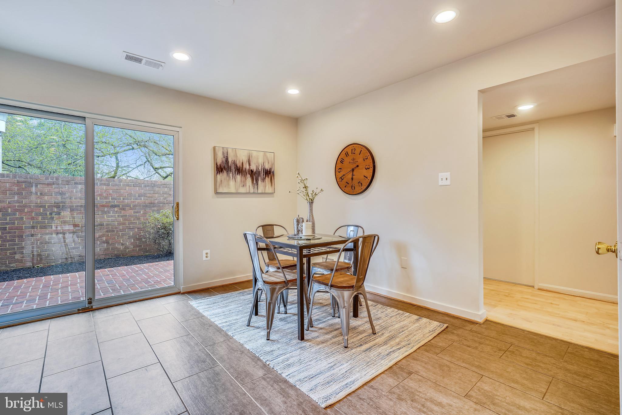 11797 Indian Ridge Road Reston, VA 20191 - Photo 11 of 33 a view of a dining room with furniture and front door