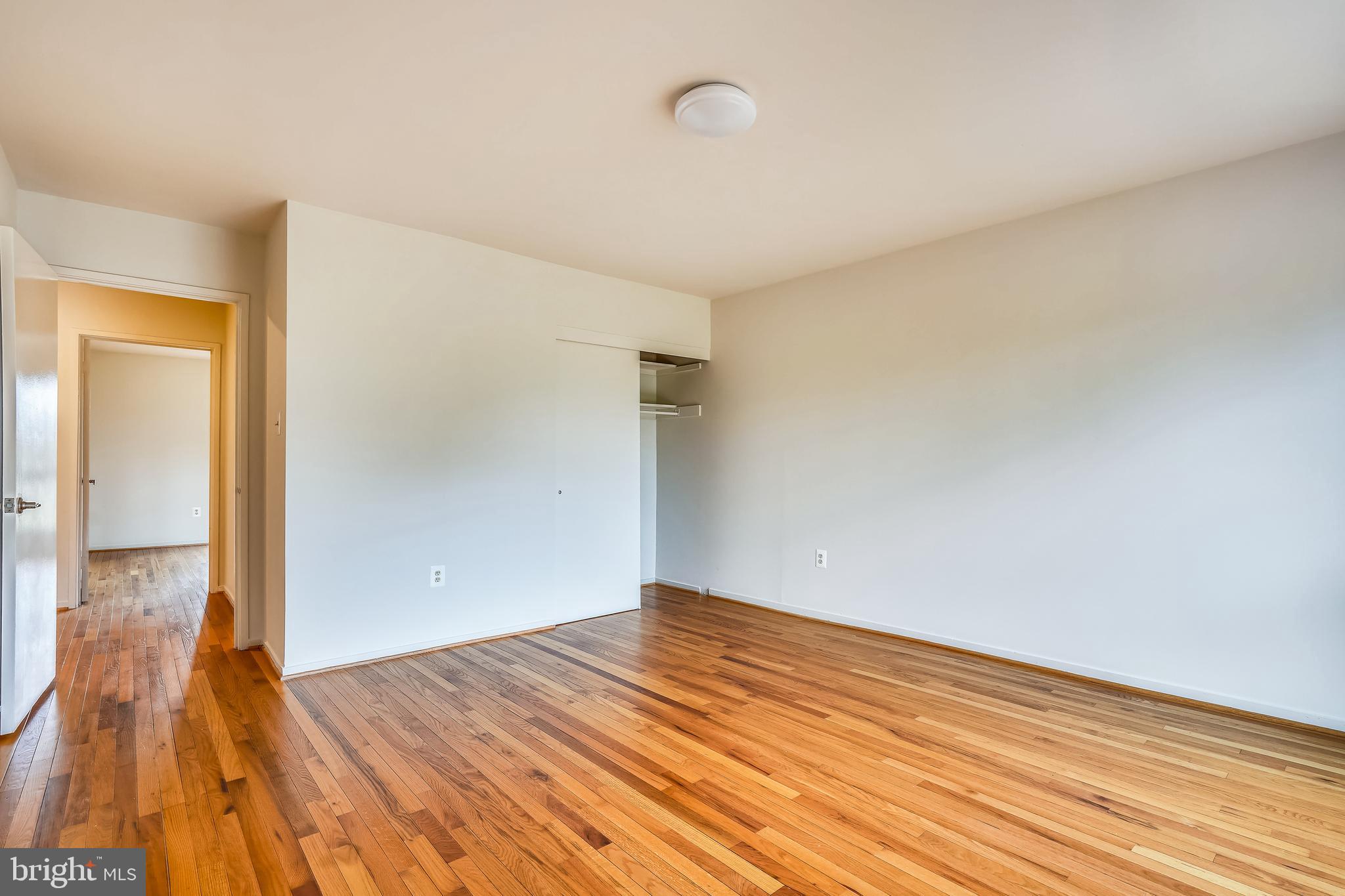 11797 Indian Ridge Road Reston, VA 20191 - Photo 23 of 33 a view of empty room with wooden floor