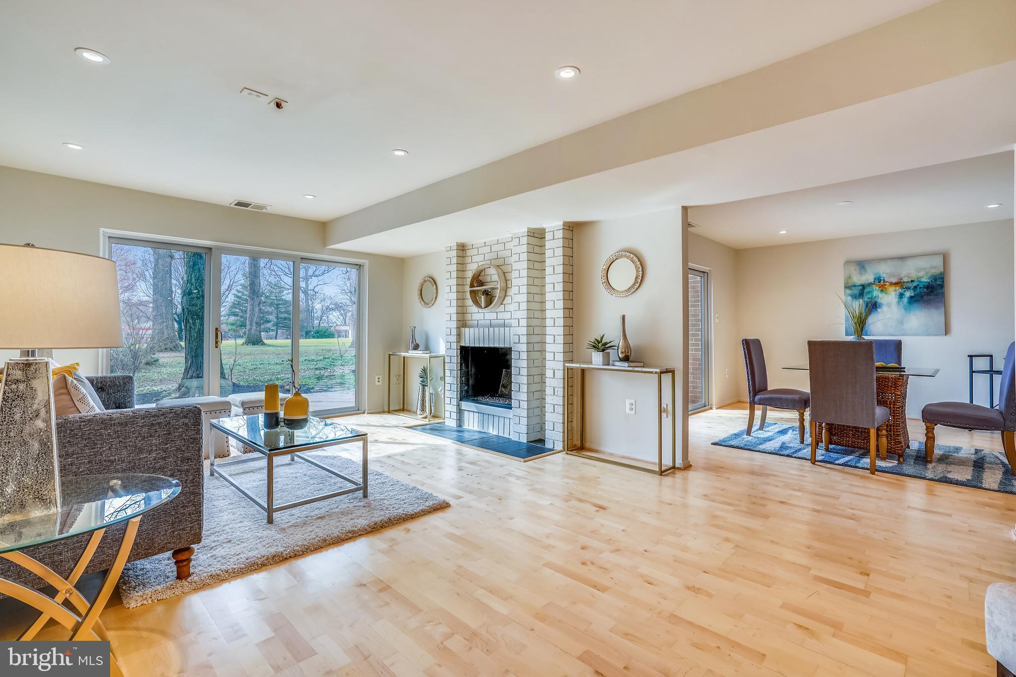 11797 Indian Ridge Road Reston, VA 20191 - Photo 4 of 33 a living room with furniture and a table
