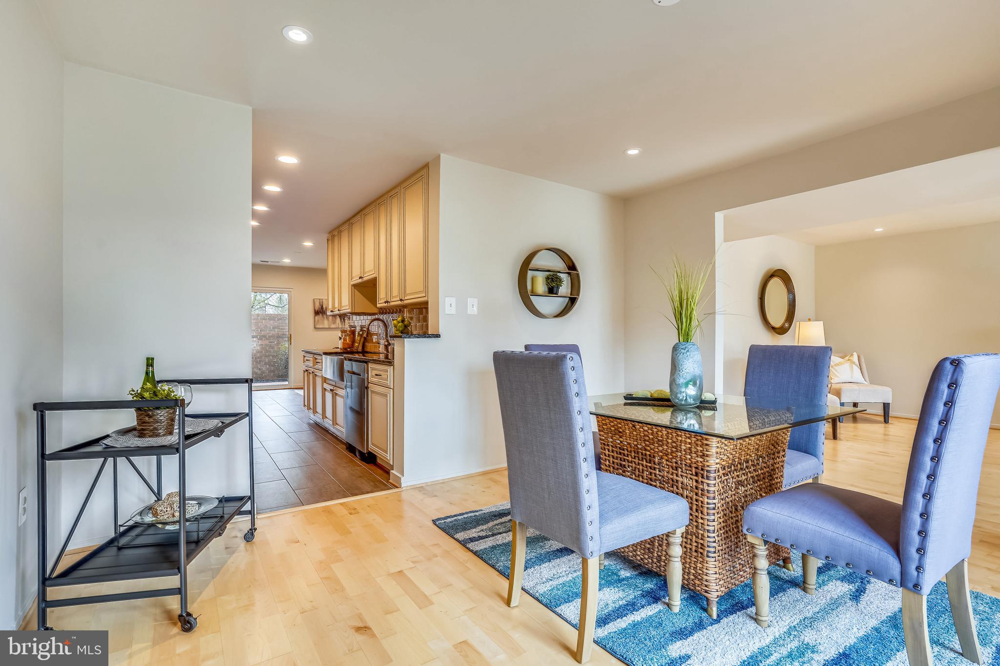 11797 Indian Ridge Road Reston, VA 20191 - Photo 5 of 33 a view of a dining room with furniture and wooden floor