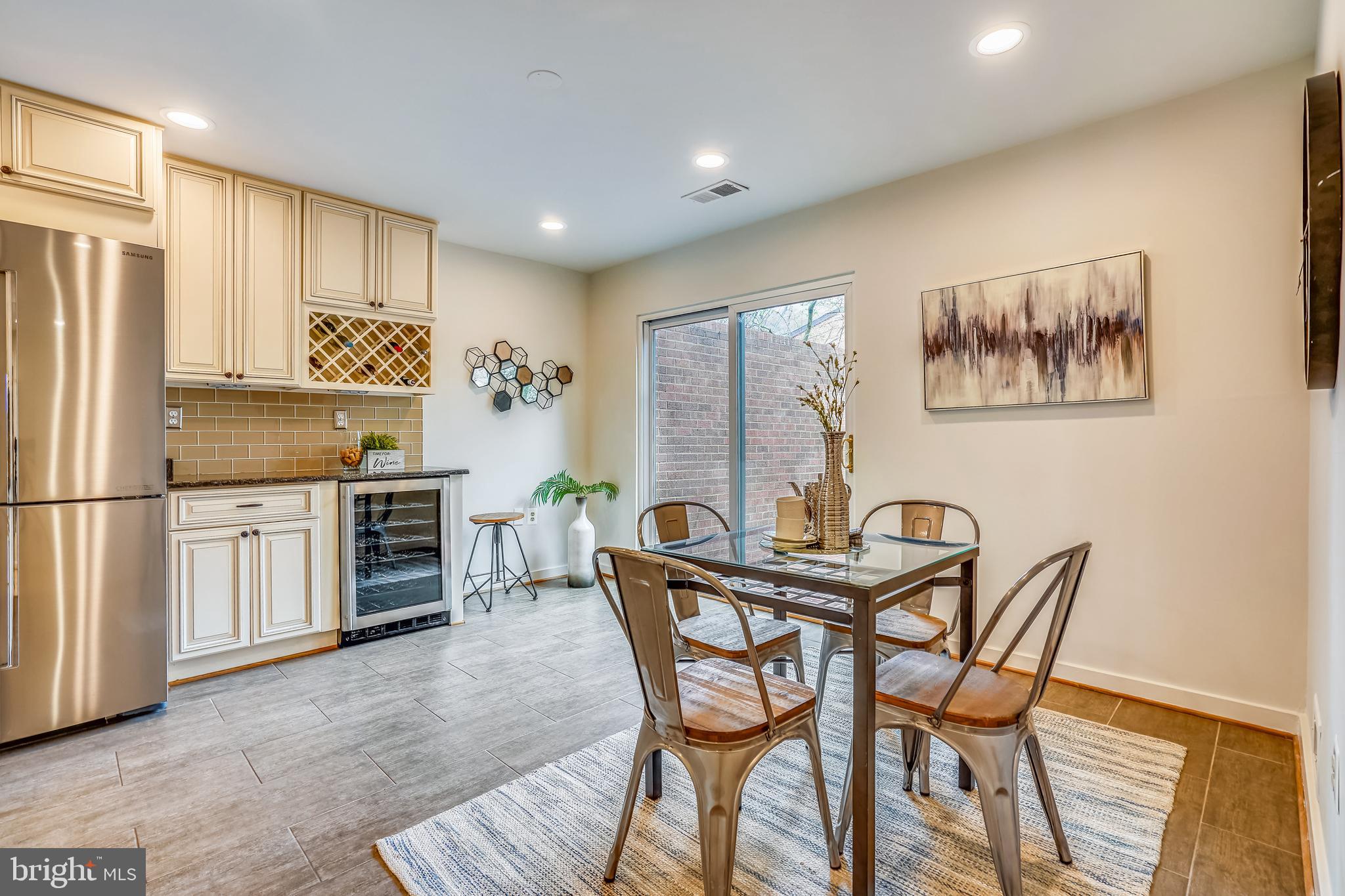 11797 Indian Ridge Road Reston, VA 20191 - Photo 9 of 33 a view of a dining room with furniture and a kitchen