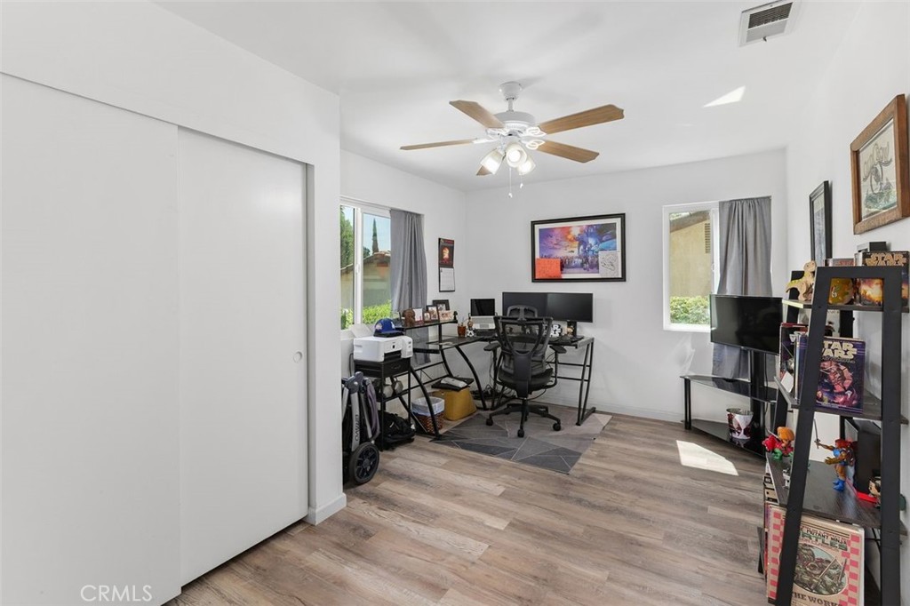 5082 Los Olivos Way Riverside, CA 92505 - Photo 18 of 36 a view of a livingroom with workspace and a window
