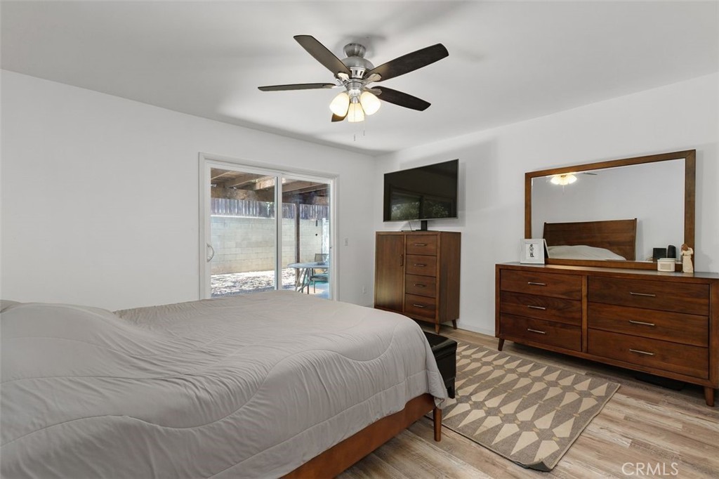 5082 Los Olivos Way Riverside, CA 92505 - Photo 25 of 36 a bedroom with a bed and window
