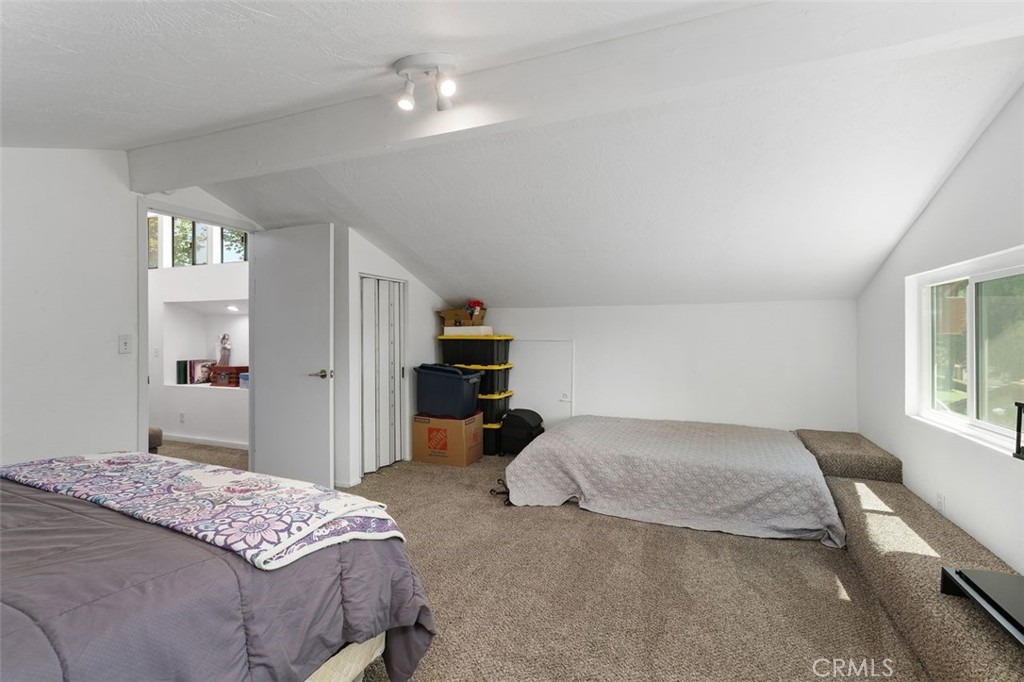 5082 Los Olivos Way Riverside, CA 92505 - Photo 31 of 36 a bedroom with a bed and window